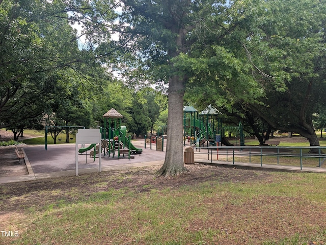 community jungle gym featuring fence