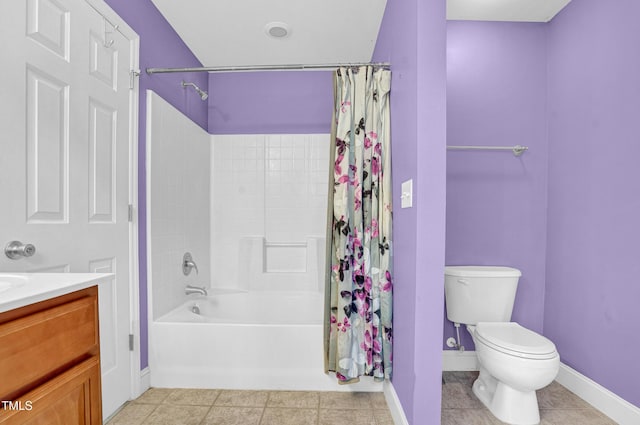 bathroom with vanity, toilet, baseboards, tile patterned flooring, and shower / tub combo with curtain
