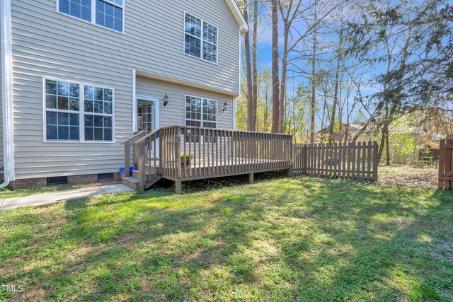exterior space with a yard and fence