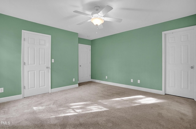 unfurnished bedroom with baseboards and carpet floors