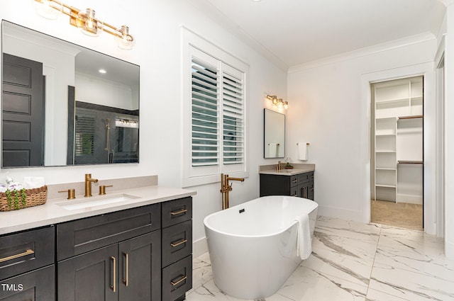 full bath with a sink, marble finish floor, and ornamental molding
