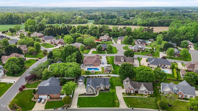 aerial view with a view of trees and a residential view