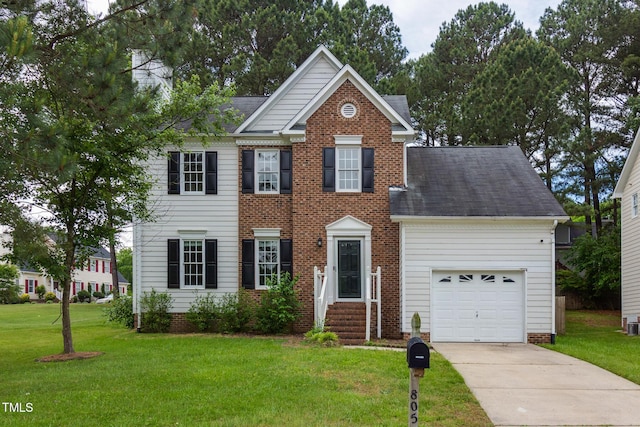 805 Penncross Dr, Raleigh, NC 27610 - view of front of house featuring a garage, a front yard, concrete driveway, roof with shingles, and entry steps