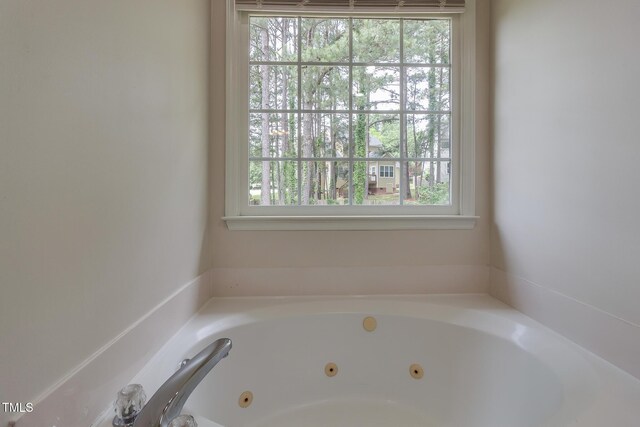 805 Penncross Dr, Raleigh, NC 27610 - full bathroom featuring a tub with jets