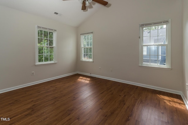 805 Penncross Dr, Raleigh, NC 27610 - empty room with a ceiling fan, healthy amount of natural light, dark wood-type flooring, and high vaulted ceiling