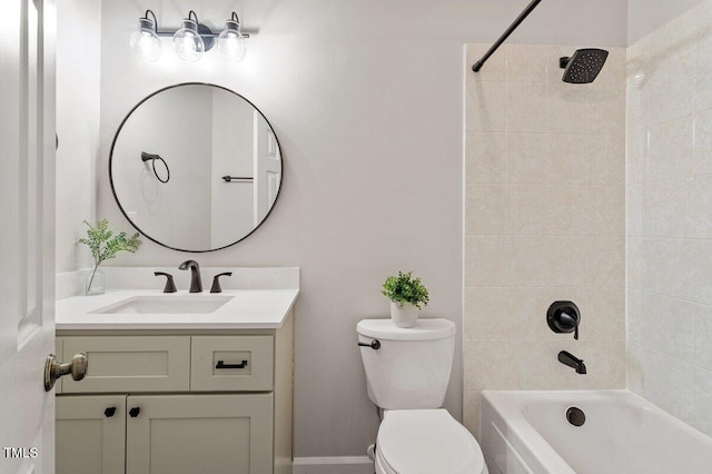 bathroom featuring vanity, toilet, and  shower combination