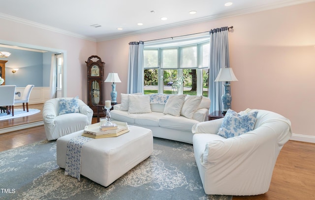 11 Pine Forest Dr, Siler City, NC 27344 - living area with wainscoting, ornamental molding, wood finished floors, and recessed lighting