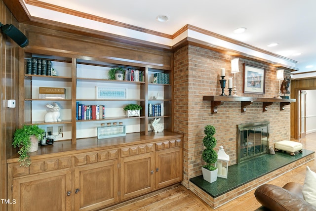 11 Pine Forest Dr, Siler City, NC 27344 - interior space featuring ornamental molding, a brick fireplace, light wood finished floors, and recessed lighting