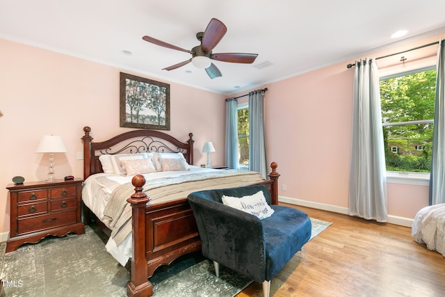 11 Pine Forest Dr, Siler City, NC 27344 - bedroom with baseboards, ornamental molding, visible vents, and light wood-type flooring