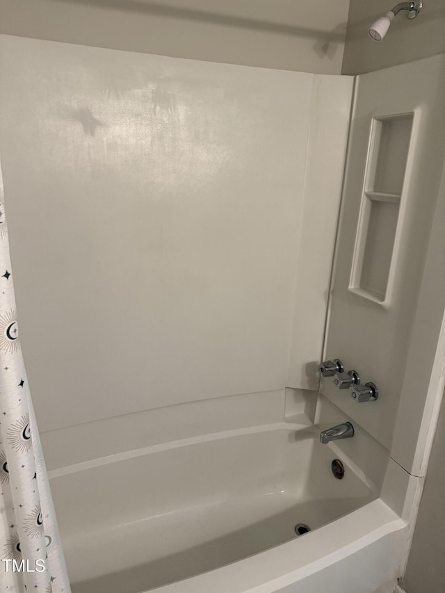 full bath featuring shower / bathtub combination with curtain