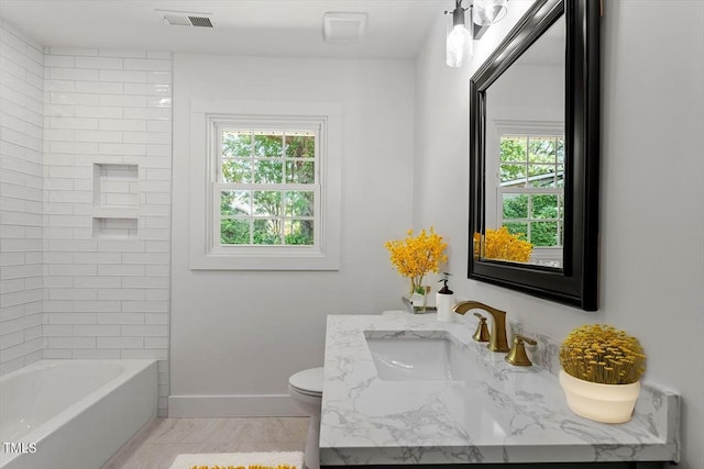 full bath with baseboards, visible vents, toilet, and a wealth of natural light
