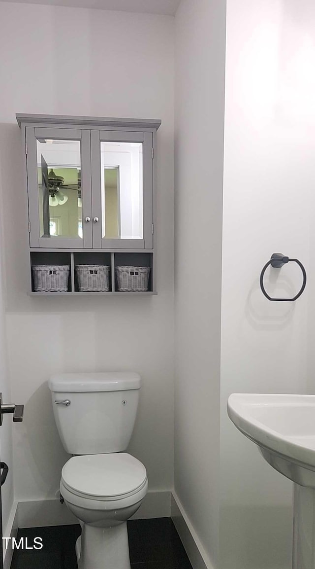 1314 Hudson Ave, Durham, NC 27705 - bathroom with baseboards and toilet