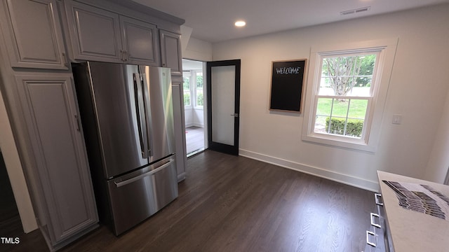 1314 Hudson Ave, Durham, NC 27705 - kitchen with freestanding refrigerator, baseboards, healthy amount of natural light, light countertops, and recessed lighting