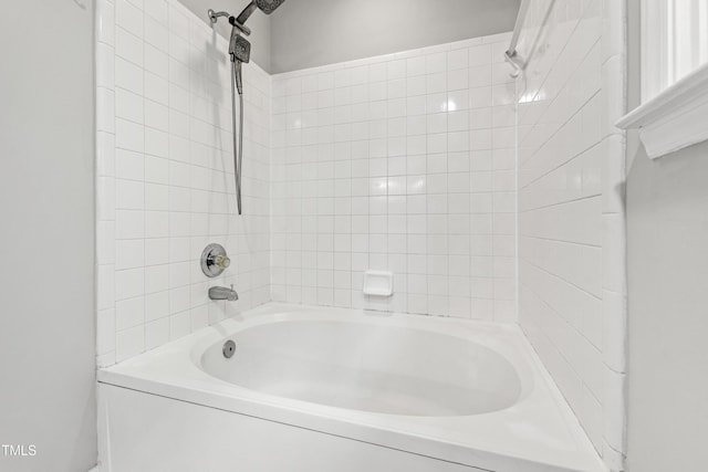 bathroom with shower / bath combination