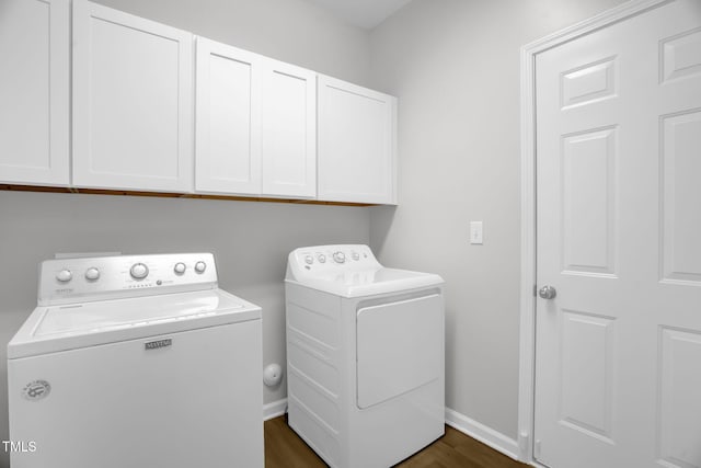1305 Montreux Ct, Mebane, NC 27302 - laundry area featuring washer and clothes dryer, cabinet space, dark wood-style floors, and baseboards