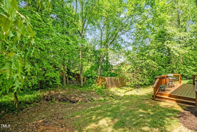 1305 Montreux Ct, Mebane, NC 27302 - view of yard featuring a wooden deck and fence