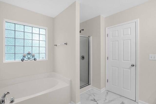 1305 Montreux Ct, Mebane, NC 27302 - bathroom with a stall shower, marble finish floor, and a wealth of natural light