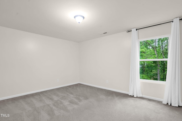 1305 Montreux Ct, Mebane, NC 27302 - unfurnished room featuring visible vents, baseboards, and carpet floors