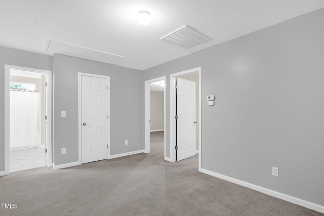 1305 Montreux Ct, Mebane, NC 27302 - unfurnished bedroom with attic access, visible vents, carpet flooring, and baseboards