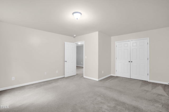 1305 Montreux Ct, Mebane, NC 27302 - unfurnished bedroom with a closet, carpet flooring, and baseboards