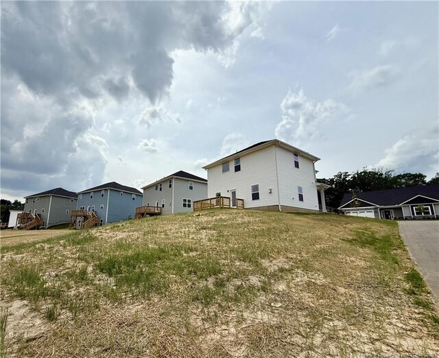 rear view of house featuring a residential view