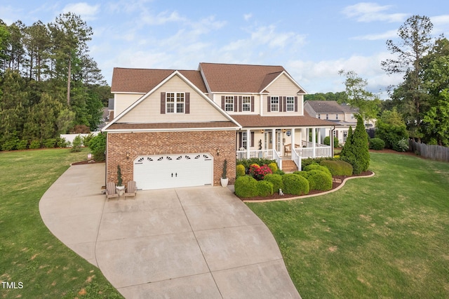 48 Falling Oak Ct, Clayton, NC 27520 - traditional home featuring covered porch, concrete driveway, an attached garage, and a front yard