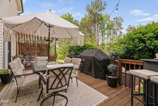 48 Falling Oak Ct, Clayton, NC 27520 - wooden deck featuring outdoor dining space