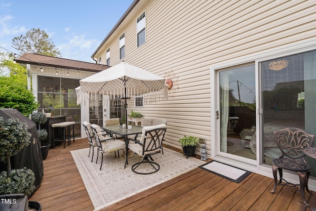 48 Falling Oak Ct, Clayton, NC 27520 - wooden terrace with outdoor dining space