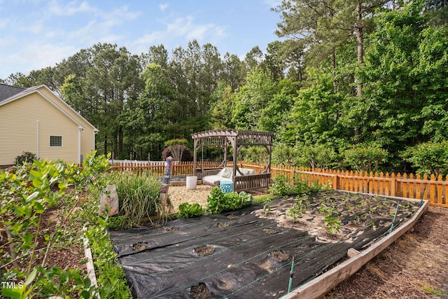 48 Falling Oak Ct, Clayton, NC 27520 - wooden deck featuring a pergola and a vegetable garden