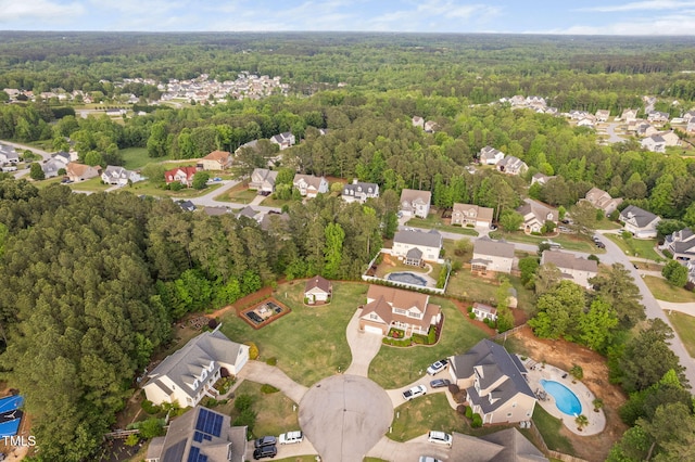 48 Falling Oak Ct, Clayton, NC 27520 - aerial view of property and surrounding area with a forest and nearby suburban area