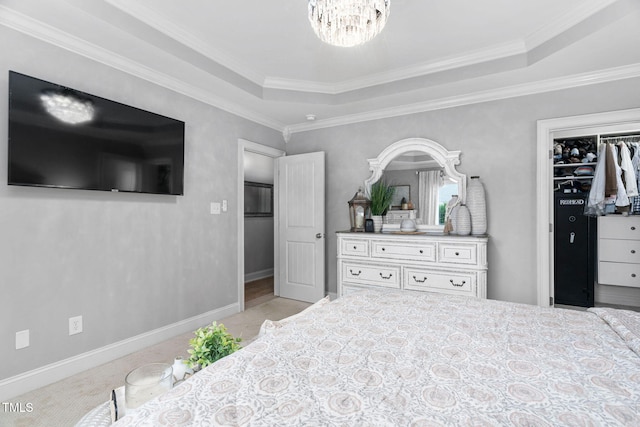 48 Falling Oak Ct, Clayton, NC 27520 - bedroom with carpet flooring, a chandelier, a raised ceiling, and ornamental molding