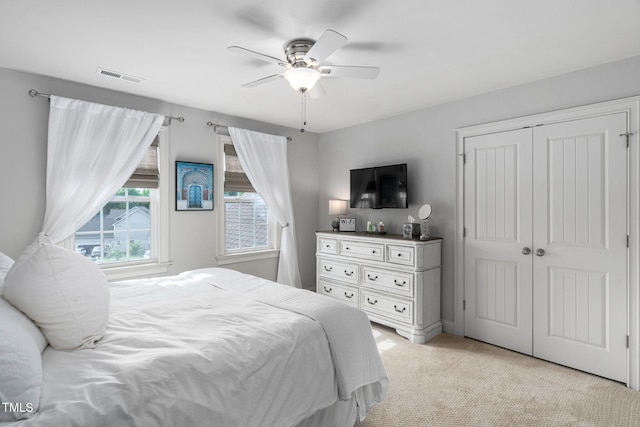 48 Falling Oak Ct, Clayton, NC 27520 - bedroom featuring light colored carpet, a closet, and ceiling fan