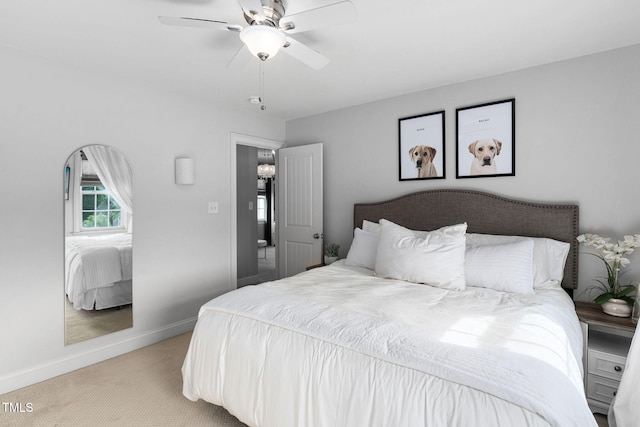 48 Falling Oak Ct, Clayton, NC 27520 - bedroom with light carpet, baseboards, and ceiling fan