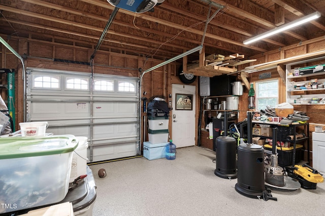 48 Falling Oak Ct, Clayton, NC 27520 - garage featuring a garage door opener