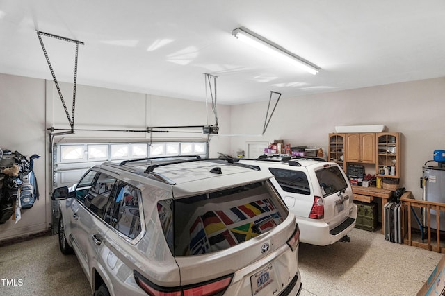 48 Falling Oak Ct, Clayton, NC 27520 - garage featuring water heater and a garage door opener