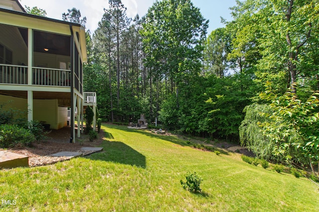 197 Boxwood Dr, Pittsboro, NC 27312 - view of green lawn featuring a sunroom