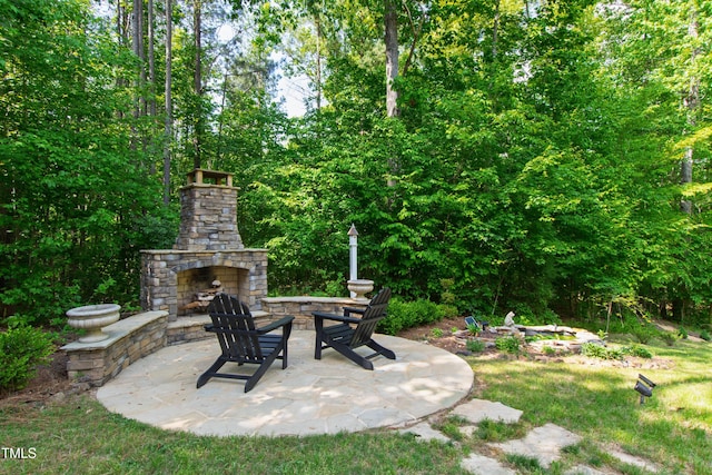 197 Boxwood Dr, Pittsboro, NC 27312 - view of patio with an outdoor stone fireplace