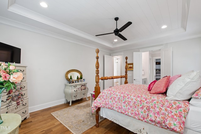 197 Boxwood Dr, Pittsboro, NC 27312 - bedroom with a raised ceiling, wood finished floors, baseboards, recessed lighting, and crown molding