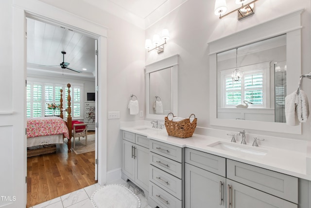 197 Boxwood Dr, Pittsboro, NC 27312 - bathroom with plenty of natural light, ceiling fan, ensuite bathroom, double vanity, and crown molding