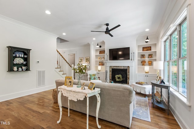 197 Boxwood Dr, Pittsboro, NC 27312 - living area featuring a ceiling fan, healthy amount of natural light, baseboards, crown molding, and recessed lighting