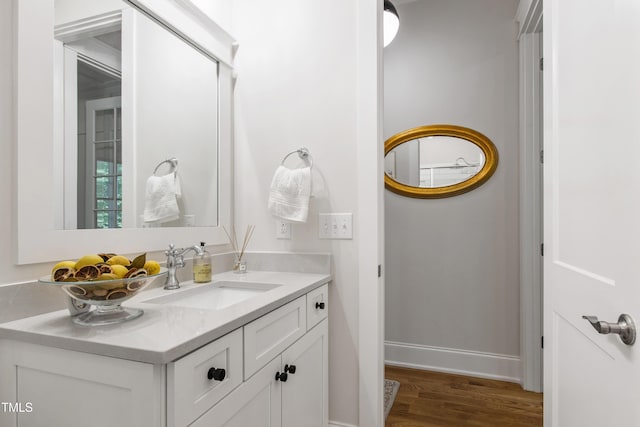 197 Boxwood Dr, Pittsboro, NC 27312 - bathroom featuring wood finished floors, vanity, and baseboards