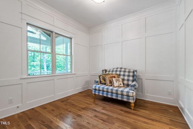 197 Boxwood Dr, Pittsboro, NC 27312 - sitting room featuring a decorative wall and wood finished floors