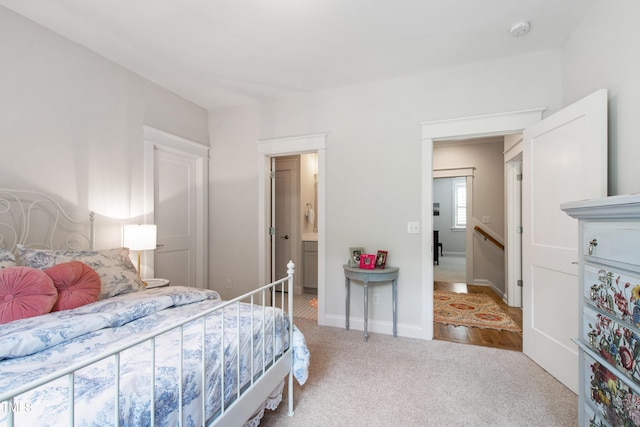 197 Boxwood Dr, Pittsboro, NC 27312 - bedroom with carpet, baseboards, and ensuite bath