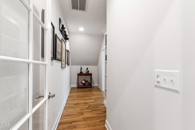 197 Boxwood Dr, Pittsboro, NC 27312 - corridor with wood finished floors, baseboards, and recessed lighting