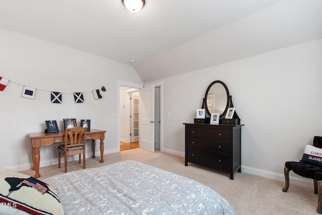 197 Boxwood Dr, Pittsboro, NC 27312 - bedroom featuring vaulted ceiling, carpet floors, and baseboards