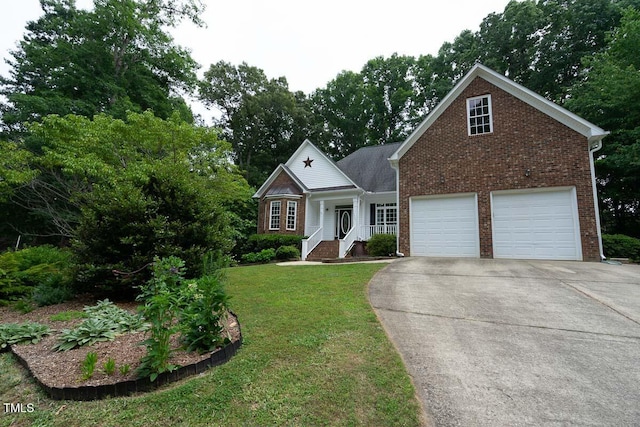 view of front of home featuring driveway, a front lawn, and brick siding