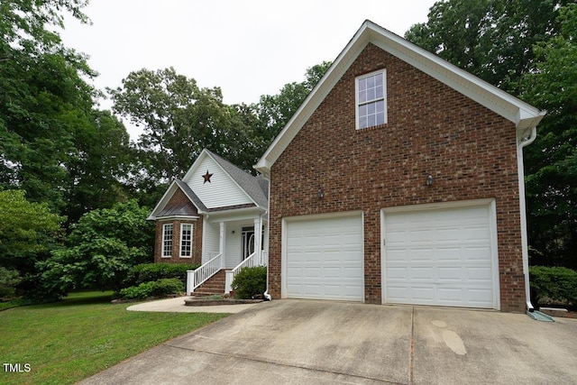 traditional-style house with a front yard, driveway, and brick siding