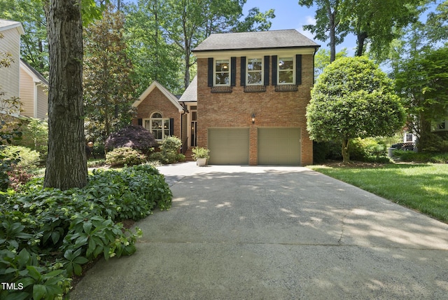view of front of house with brick siding, an attached garage, driveway, and roof with shingles