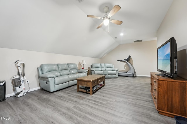 living area featuring a ceiling fan, baseboards, wood finished floors, vaulted ceiling, and visible vents