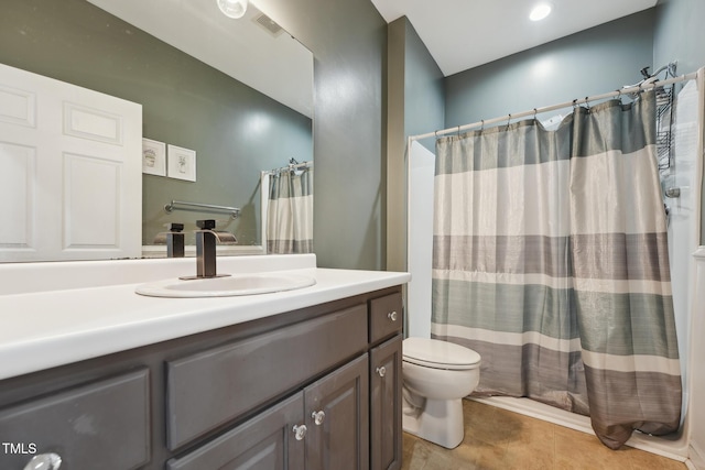 full bath featuring vanity, tile patterned floors, curtained shower, and toilet